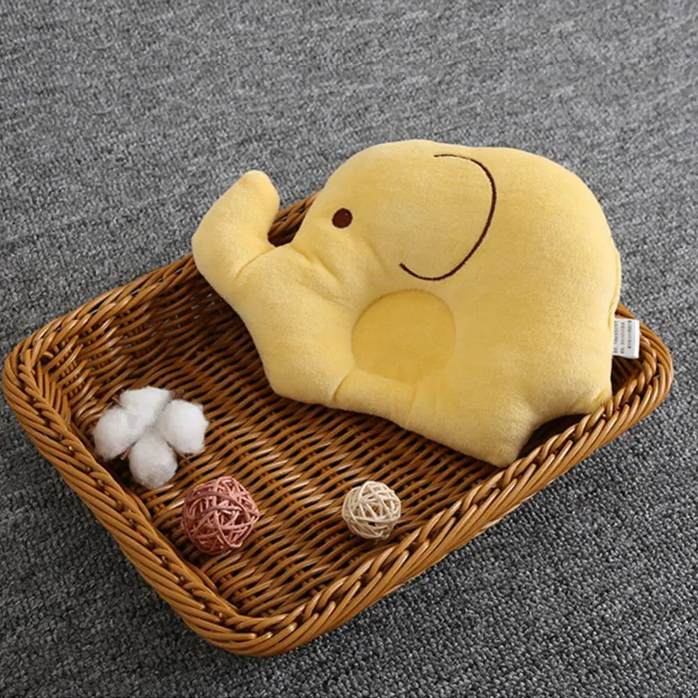 Coussin anti tête plate bébé éléphant jaune