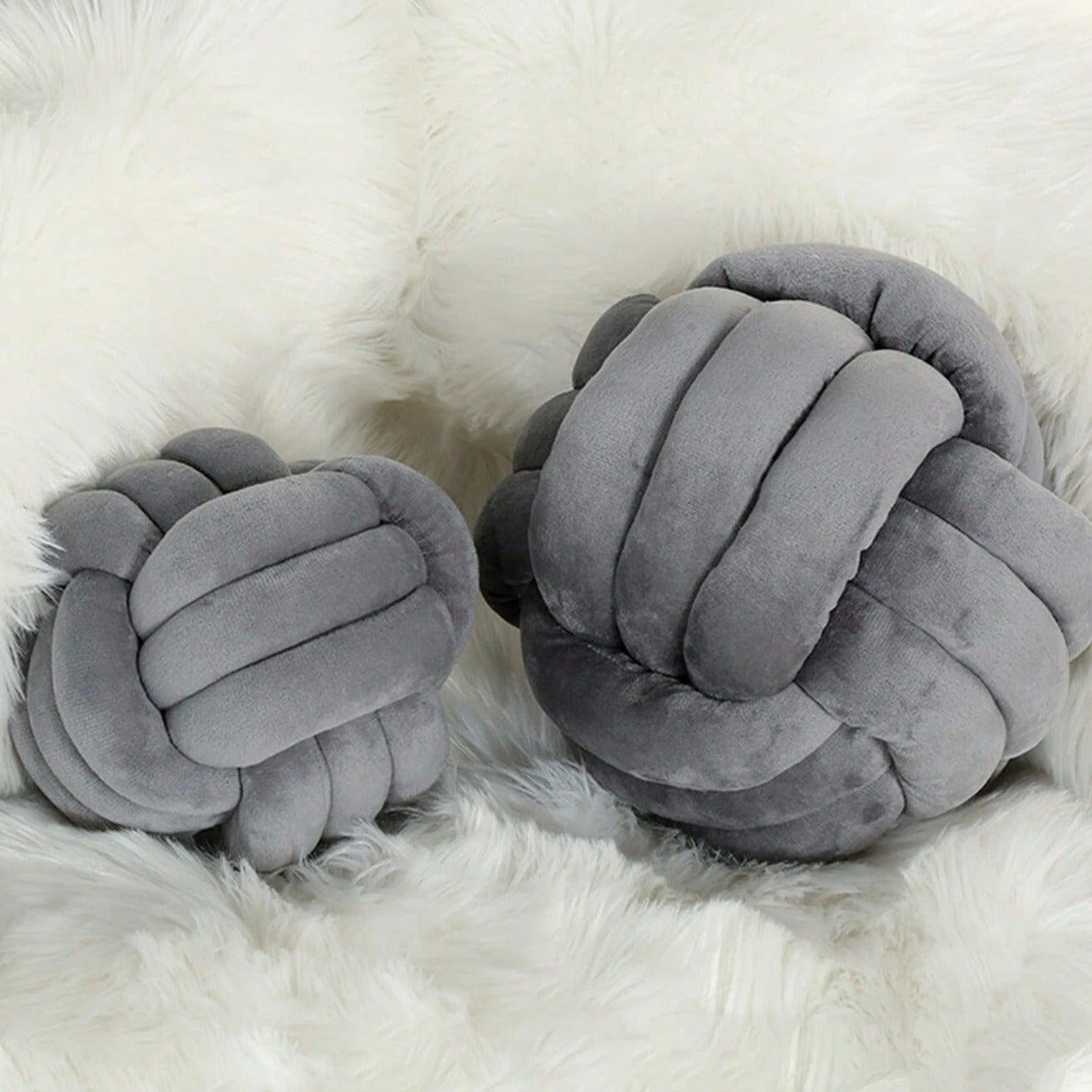 Coussin noeud gris