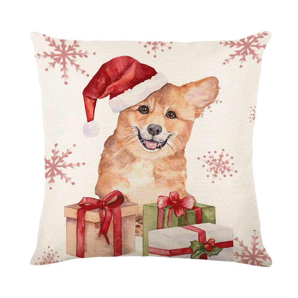 Coussin pour noël avec un chient qui porte un bonnet de noël