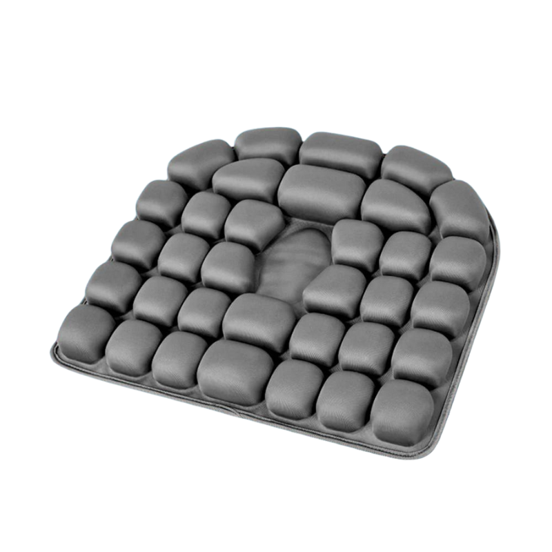 Coussin anti escarre fessier gris sur fond blanc