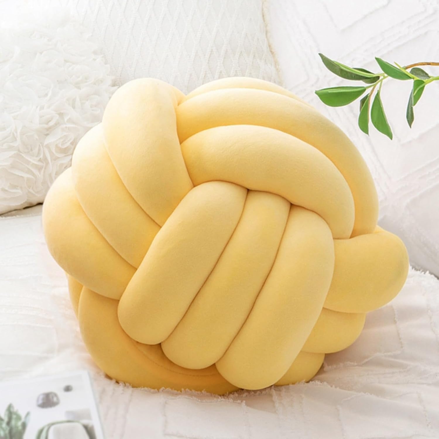 Coussin noeud jaune