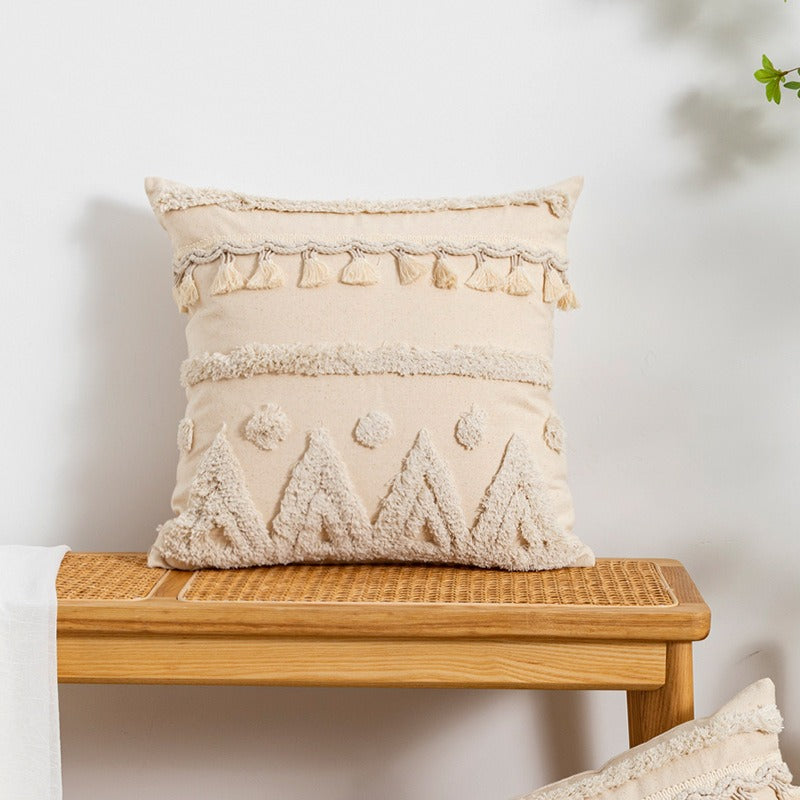 Coussin déco pour canapé avec motifs géométriques