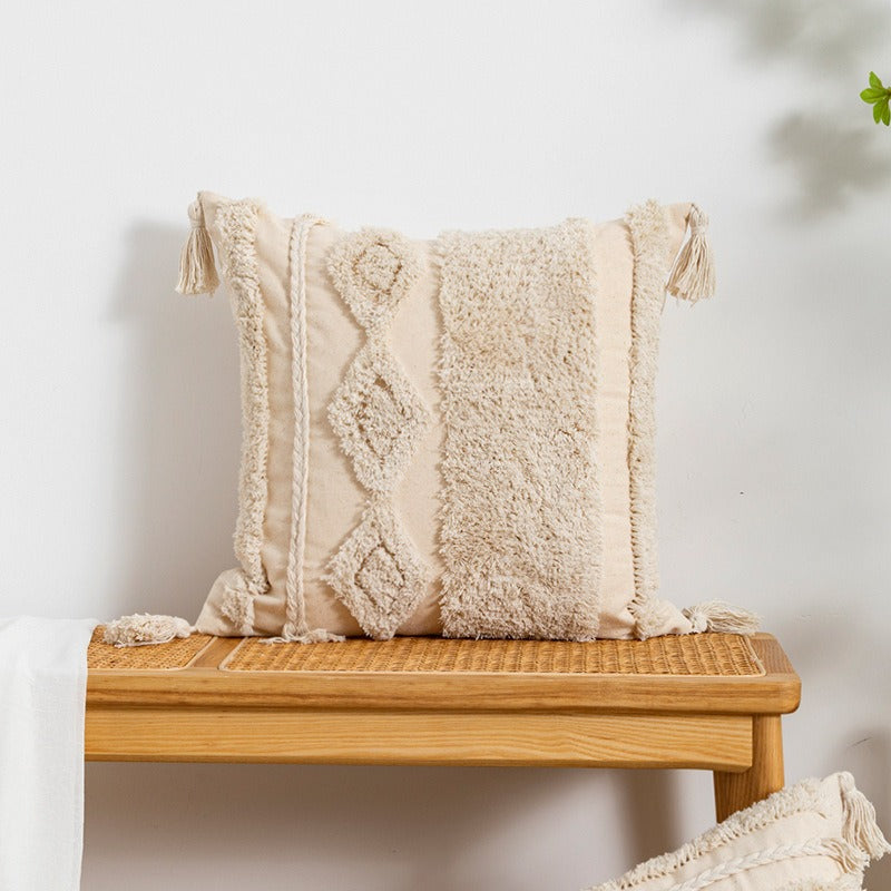 Coussin déco pour canapé avec motifs géométriques