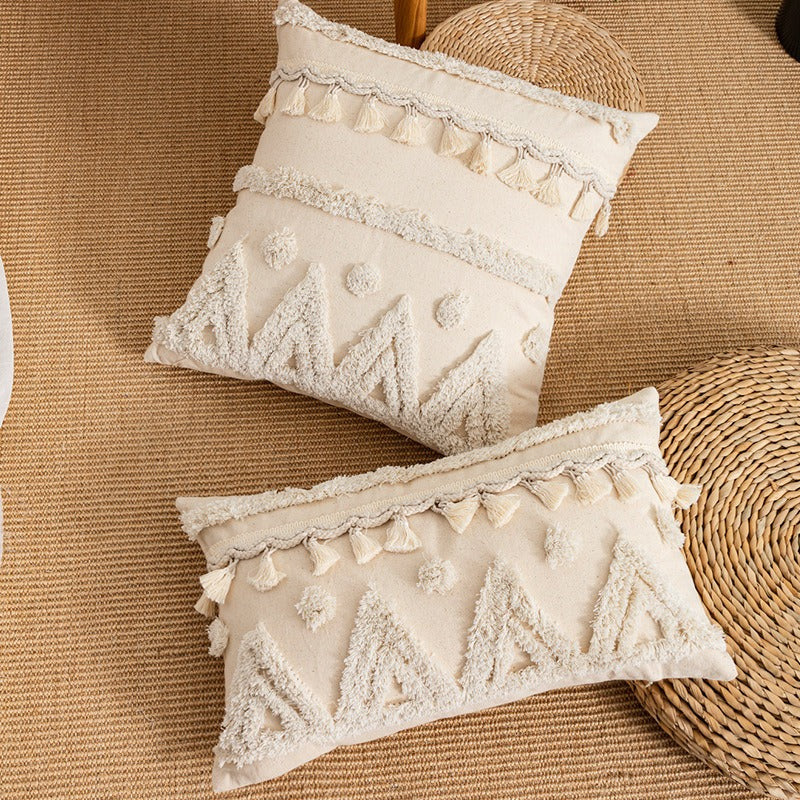 Coussin déco pour canapé avec motifs géométriques