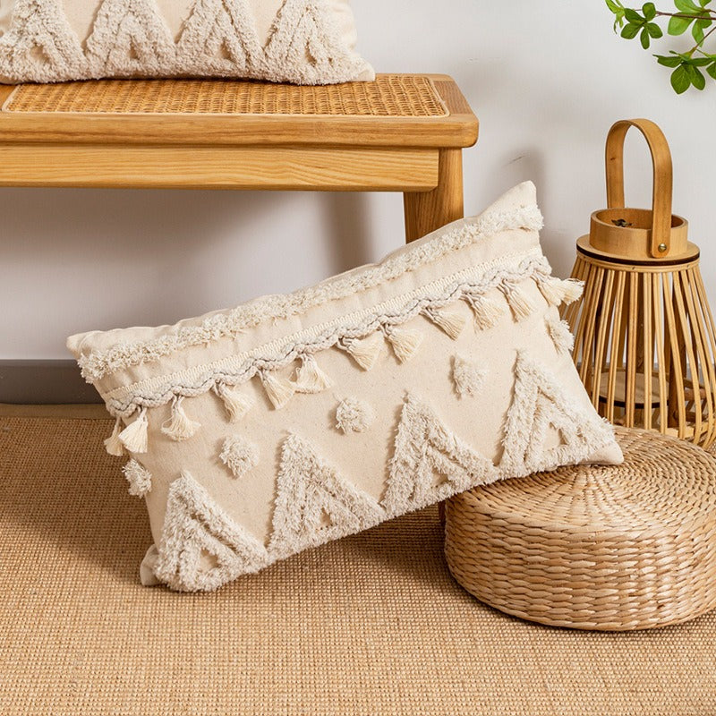 Coussin déco pour canapé avec motifs géométriques