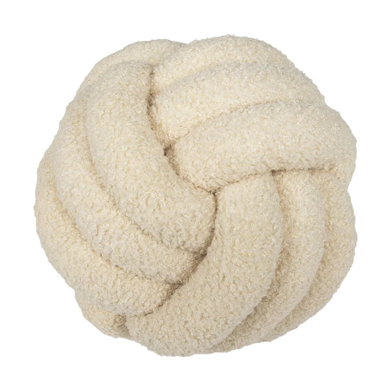 Coussin boule beige moelleux