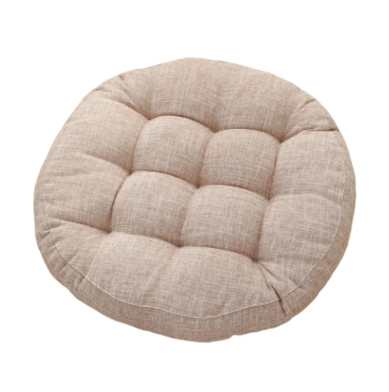 Coussin genoux yoga rond et beige sur fond blanc