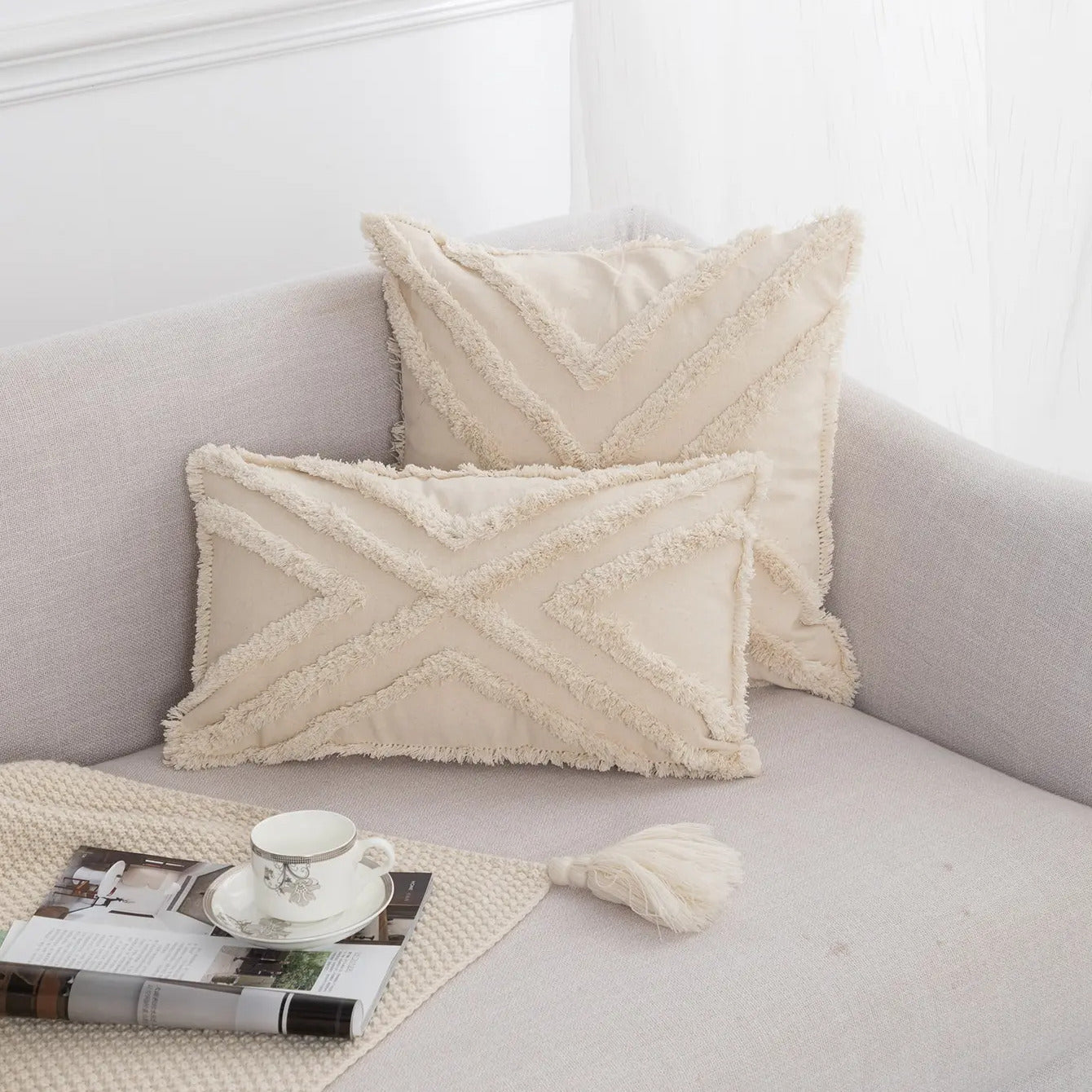 Coussin boheme chic tufté à franges