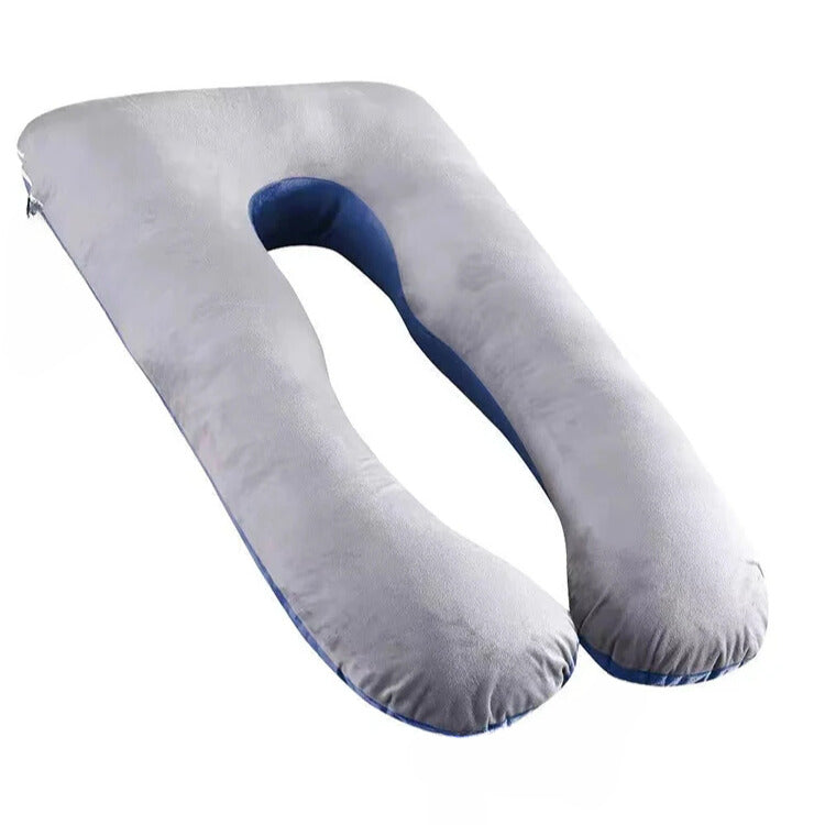 Coussin de grossesse lavable en coton ici sur un fond blanc.