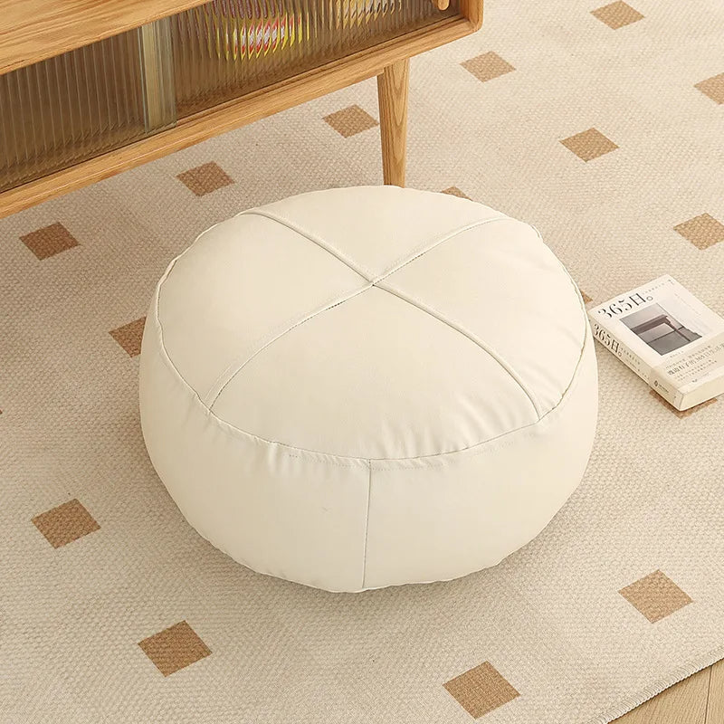 Coussin sol rond et imperméable sur un sol